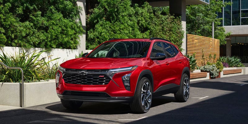 a red 2026 Chevrolet Trax is parked in Orange, CA